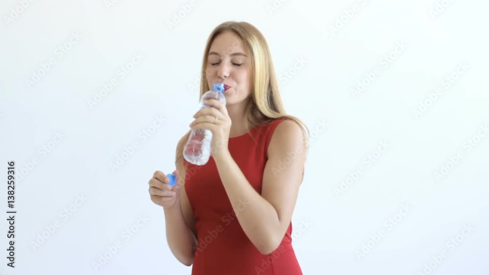 Young pretty girl drinks water Young pretty girl drinks water