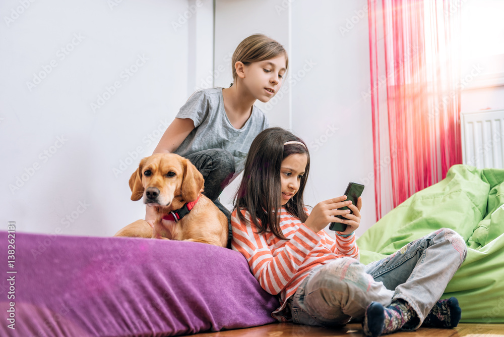 Girls using smart phone Girls using smart phone