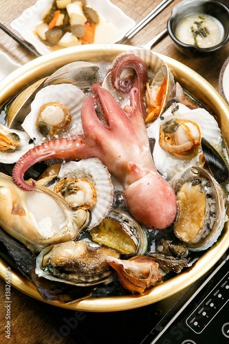 haecheuntang. assorted seafood stew.  photo