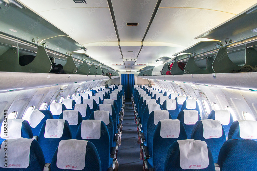 Fototapeta premium Passenger seats interior of salon of the TU 154 plane BELAVIA.Photo taken on: October 1, 2016