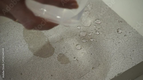 protection from water. water-repellent Gidrofobizator. pouring water on the brick processed means Gidrofobizator