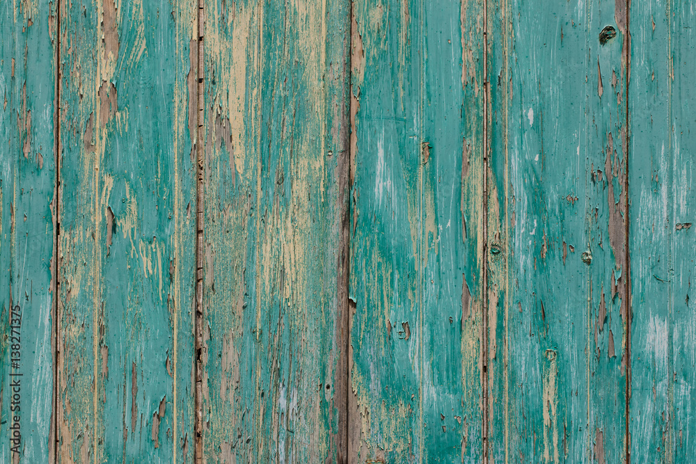 Rustic old plank background in turquoise, mint  colors with textures scratches and antique cracked paint