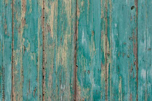 Rustic old plank background in turquoise, mint colors with textures scratches and antique cracked paint © Igor Dudchak