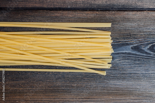 spaghetti on a wooden background
