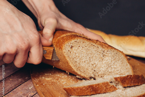 loaf of bread in hand, loaf