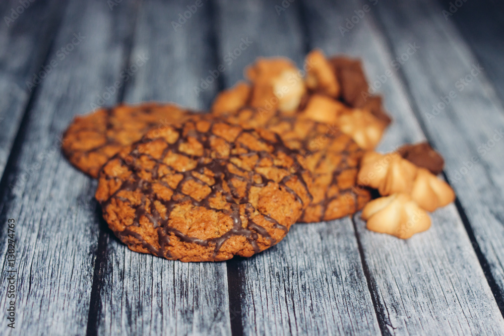 a variety of cookies on a wooden background a variety of cookies on a wooden background