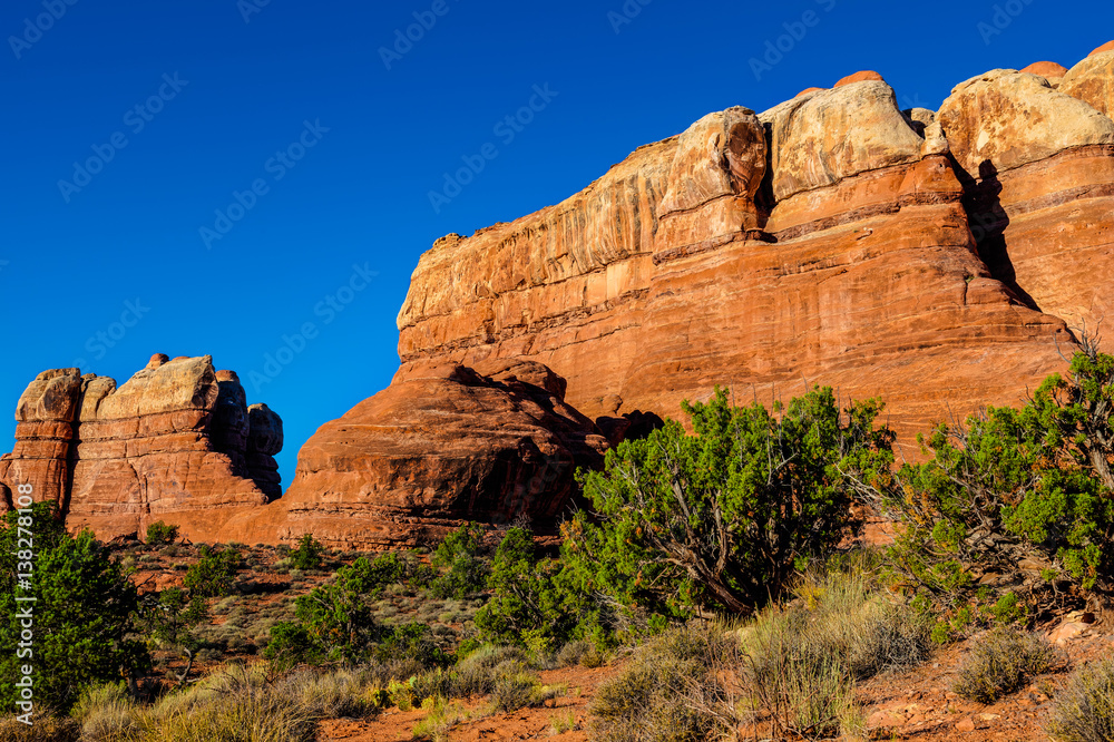 Hiking the beautiful, rough, and remote Elephant Hill Trail in the Needles District of the Canyonlands National Park in Utah, takes one to spectacular land formations and scenic views. Hiking the beautiful, rough, and remote Elephant Hill Trail in the Needles District of the Canyonlands National Park in Utah, takes one to spectacular land formations and scenic views.
