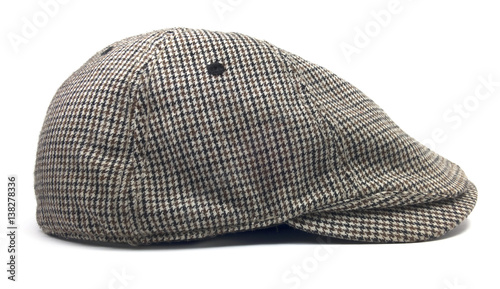 Isolated Newsboy Cap. Retro wool driver cap on a white background.