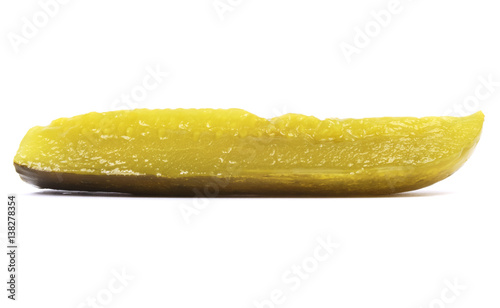 Sliced pickle on a white background.
