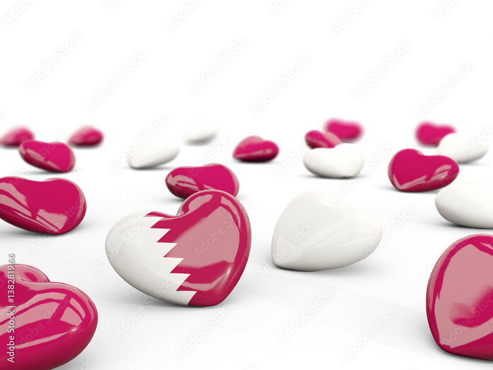 Heart with flag of qatar isolated on white Heart with flag of qatar isolated on white
