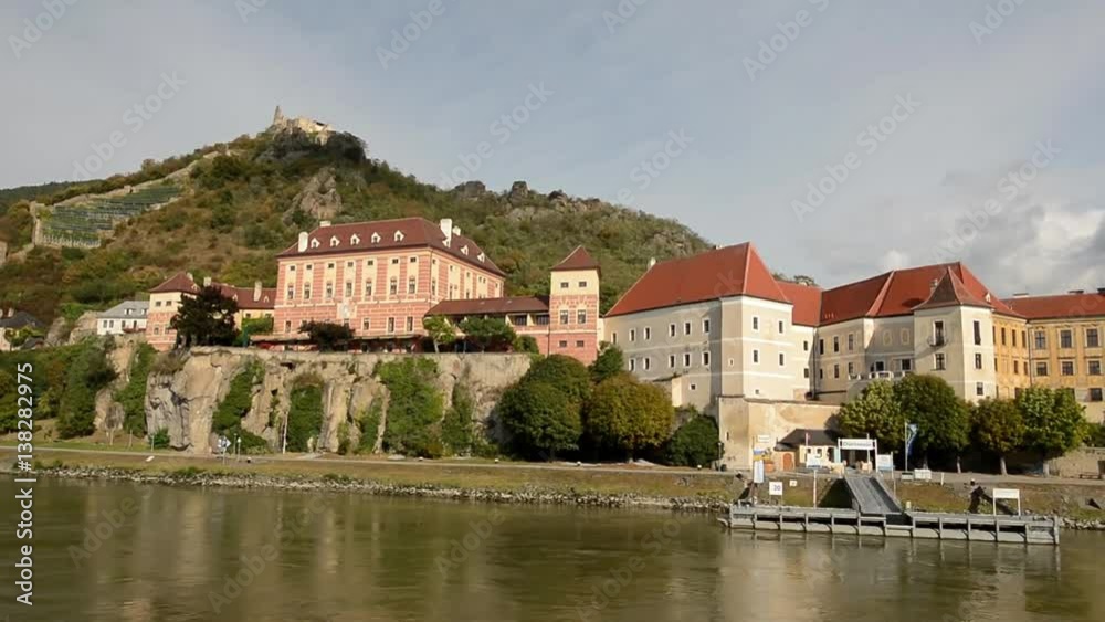Beauty shot of Durnstein, Austria from the Danube featuring town and castle Beauty shot of Durnstein, Austria from the Danube featuring town and castle