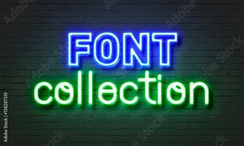 Font collection neon sign on brick wall background.