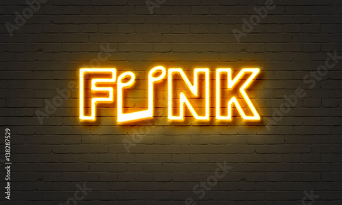 Funk neon sign on brick wall background. photo