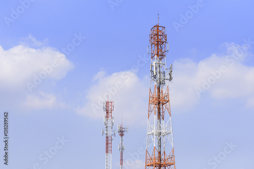 The tree telecommunication towers building with the blue sky