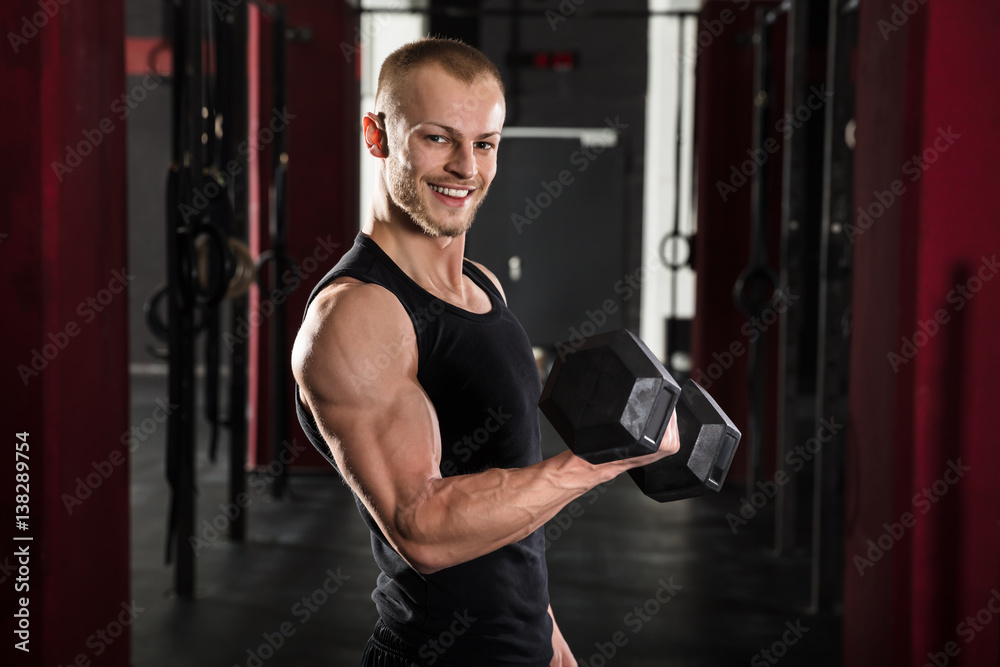 Portrait Of A Man Lifting Dumbbell Portrait Of A Man Lifting Dumbbell