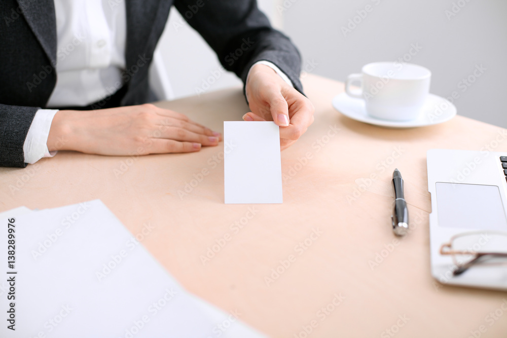 Business woman giving visit card Business woman giving visit card