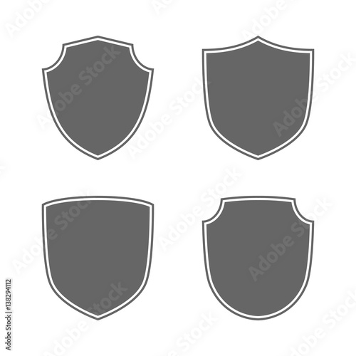 Shield shape icons set. Gray label signs isolated on white background. Symbol of protection, arms, security, safety. Flat retro style design. Element vintage heraldic emblem Vector illustration