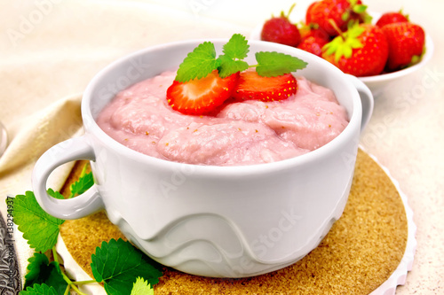 Soup strawberry in bowl on granite table