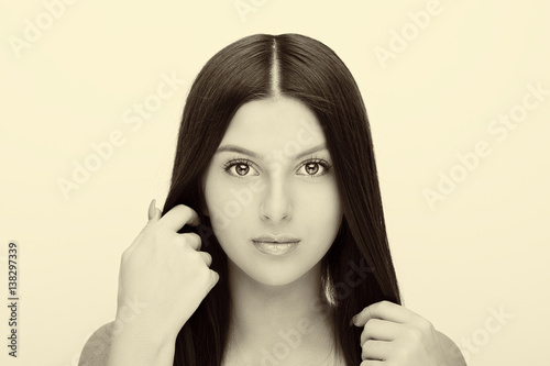 Beautiful woman face close up studio on white background.