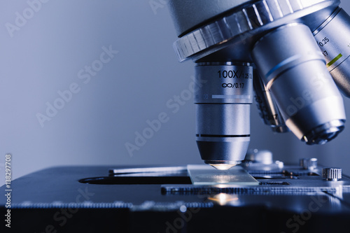 Modern microscope in the laboratory. Closeup shot.