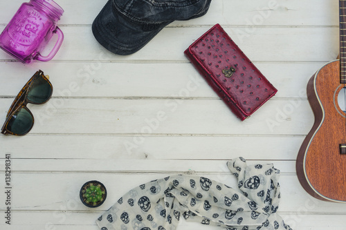 Ukulele hat wallets, sunglasses, mugs Purple Cactus small. White on the wooden floor