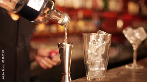 Bartender preparing cosmopolitan cocktail