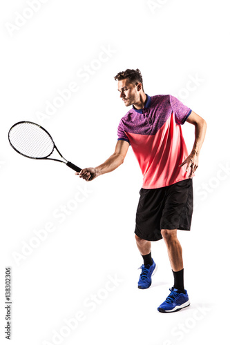 Young man  playing tennis © takoburito