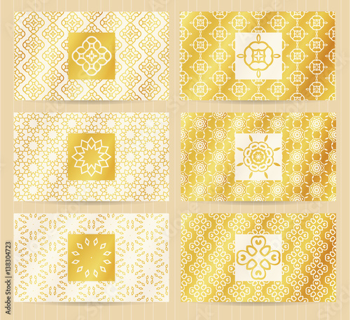 Business cards 3.5 x 2 inch size set with seamless geometric patterns and logo elements. Golden backgrounds and templates for any kind of your design.