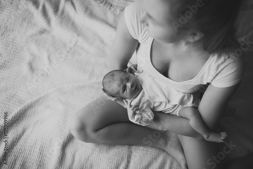 Portrait of mother and her newborn baby. photo