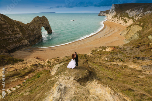 Groom and bride on the coast