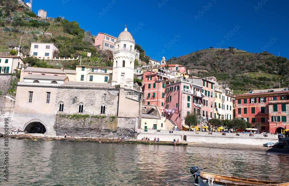 Colorful boats in the quaint port of Vernazza, Cinque Terre - Italy