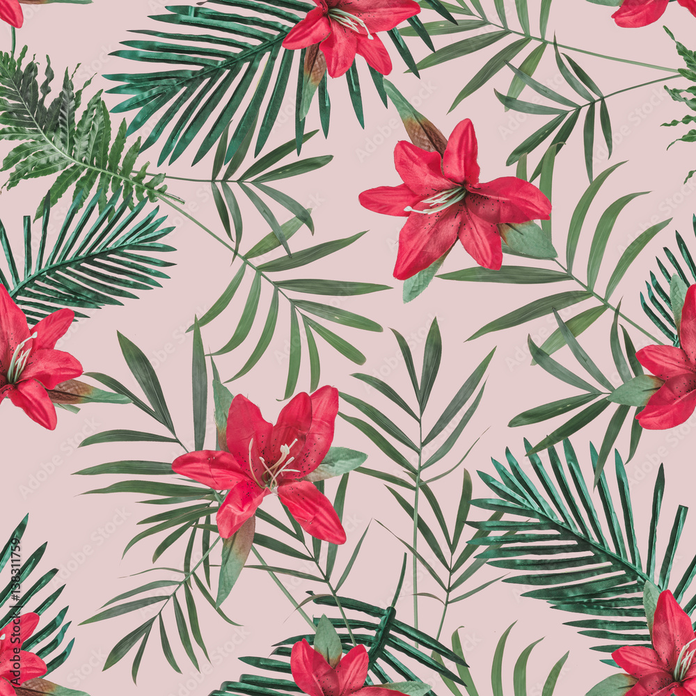 Creative seamless tropical pattern with flowers and palm leaves on blush pastel background. Nature concept