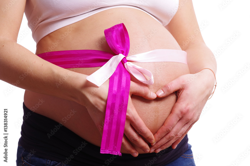 Bauch in der Schwangerschaft mit Schleife Bauch in der Schwangerschaft mit Schleife