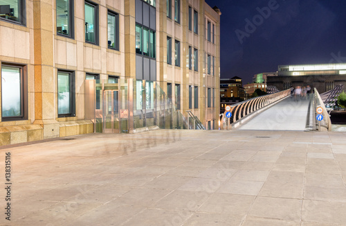 Millennium Bridge after sunset as see from northern side of Thames, London