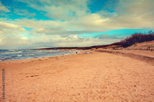 Fototapeta Naklejka Na Ścianę i Meble -  Sea shore. Deserted beach. Marine landscape with blue  ocean and beautiful cloudy sky.