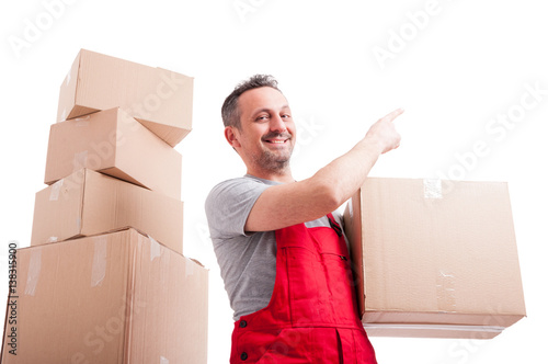 Low angle of mover man holding box pointing up