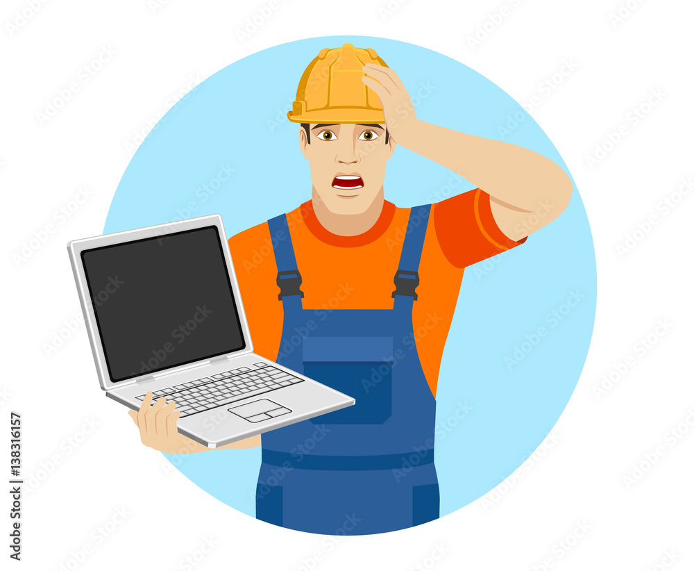 Builder with laptop grabbed his head Builder with laptop grabbed his head