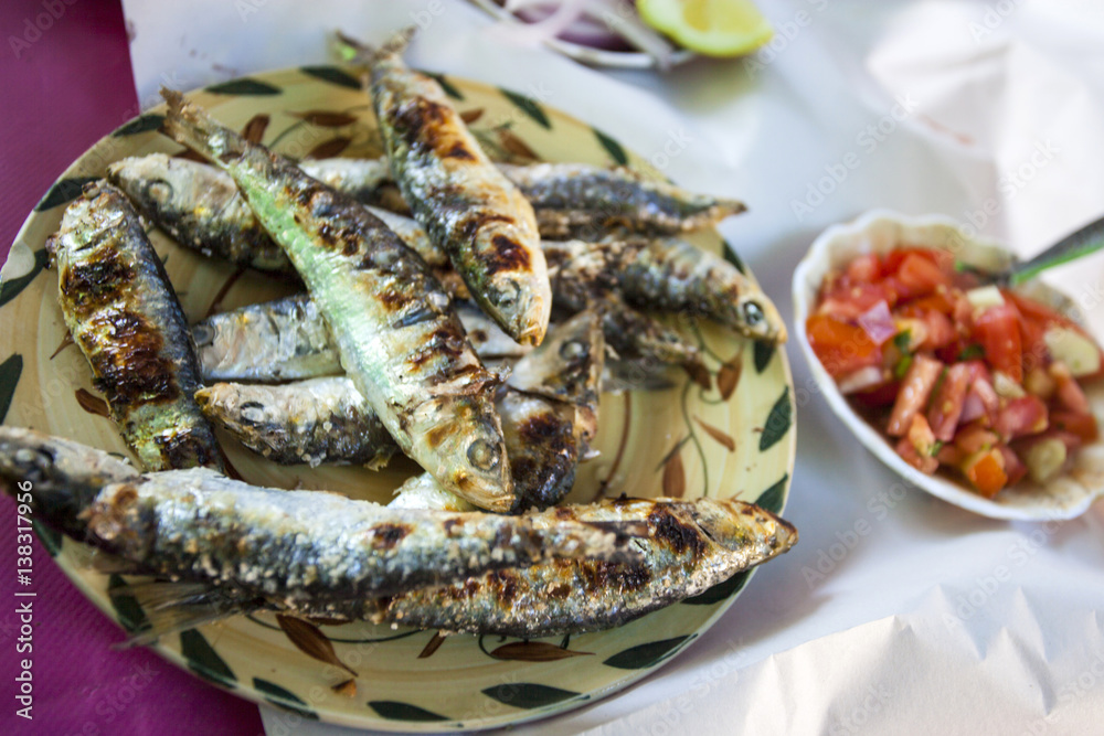 Grilled sardines and tomato salad