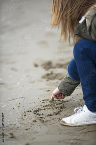 scrivere sulla sabbia