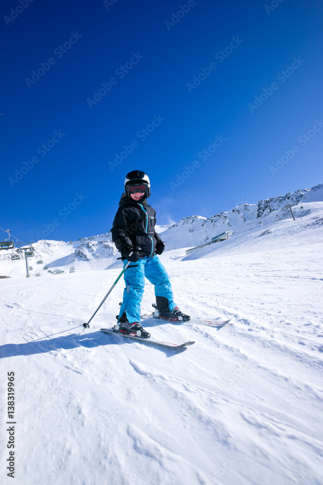 Young boy snow skiing