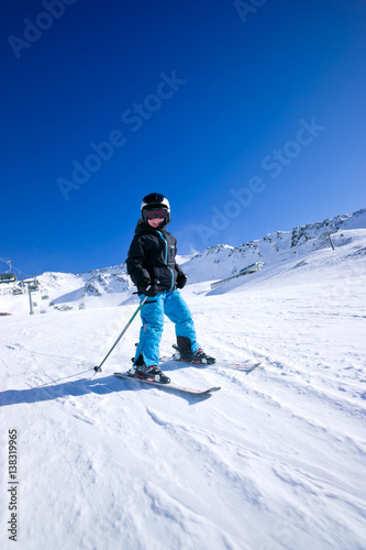Young boy snow skiing