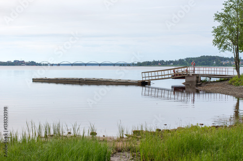 Bad och båtbrygga på en udde vid Lule älv photo