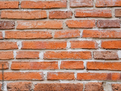 Pattern of ancient brown brick wall background