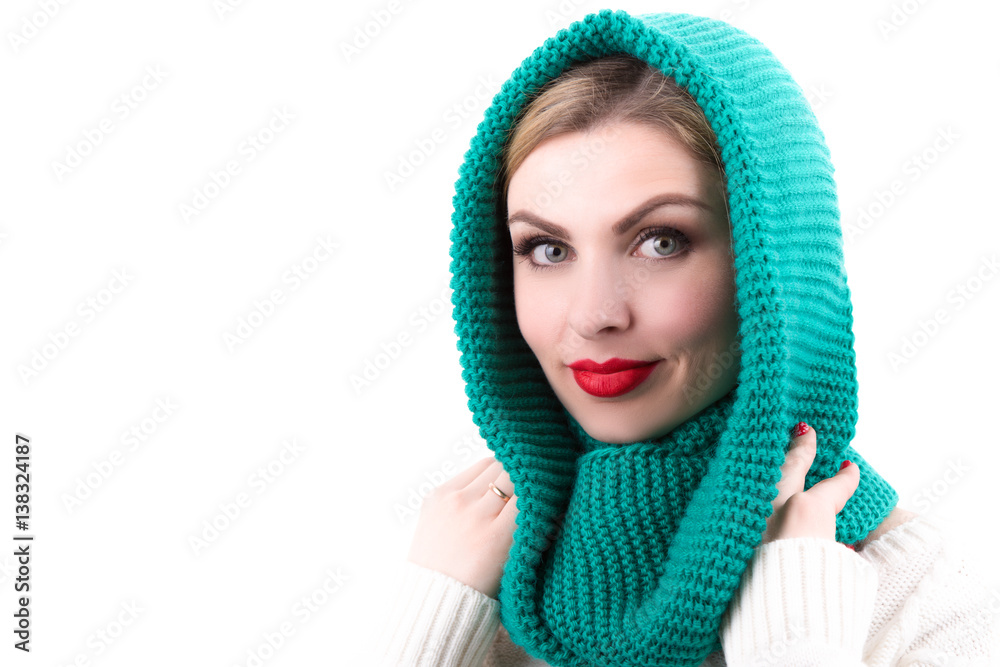 The girl dressed in a bright knitted scarf The girl dressed in a bright knitted scarf