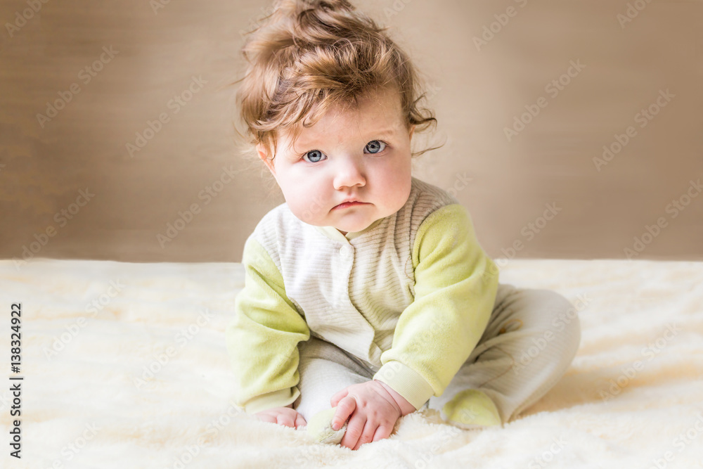 Fototapeta premium Beautiful little baby sitting.
