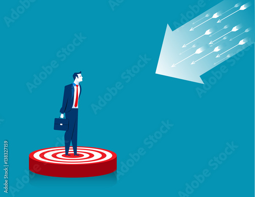 Businessman standing on target