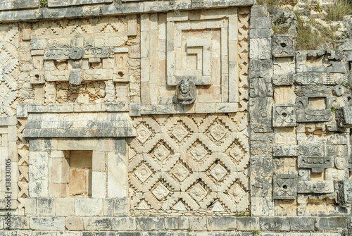   Mayan reliefs in the quadrangle of the nuns in the archaeological Uxmal enclosure in Yucatan  Mexico.