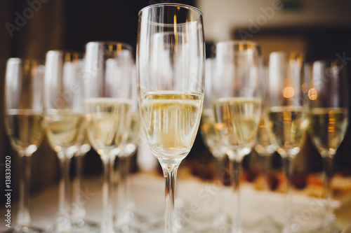 glasses of champagne on on blurred background
