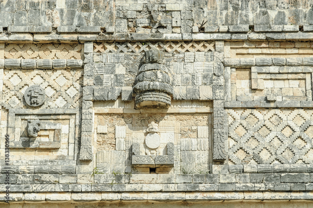 
Mayan reliefs in the quadrangle of the nuns in the archaeological Uxmal enclosure in Yucatan, Mexico.