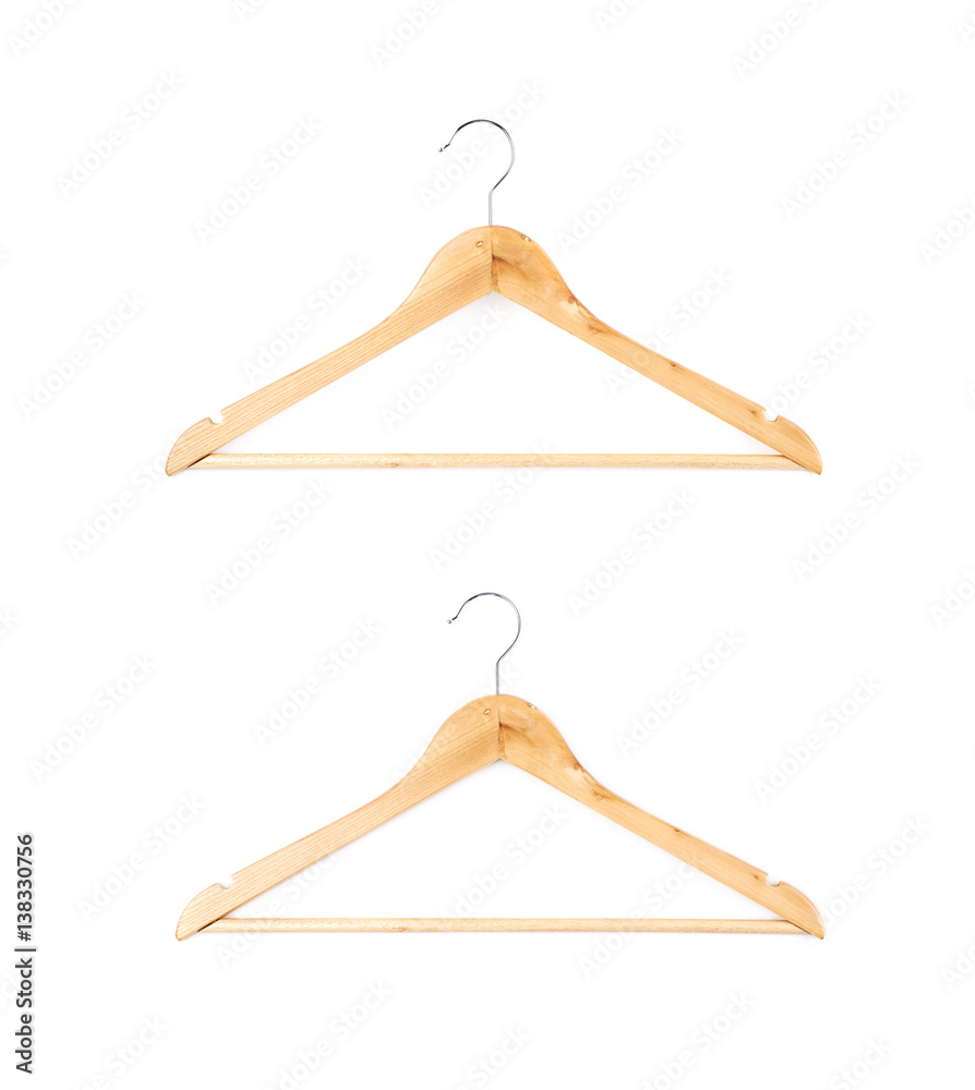 Single white wooden hanger isolated Single white wooden hanger isolated